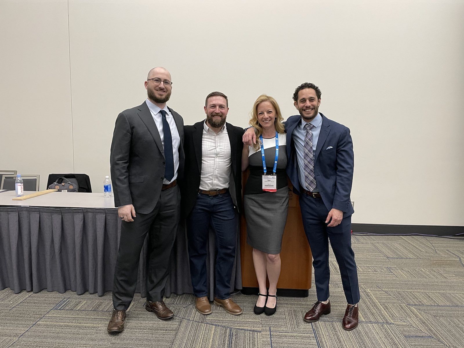 Chris with fellow panelists after a national conference session